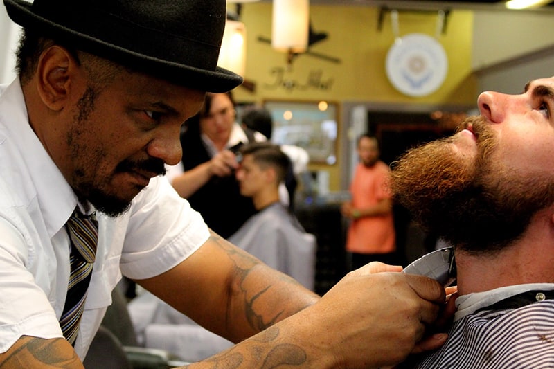 Find an accredited barbering program at a local trade school