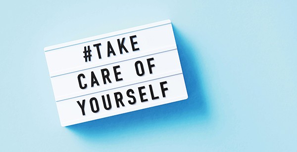 A sign proclaiming #TakeCareofYourself, representing the blog's focus on various ways to relieve and manage stress for improved well-being.